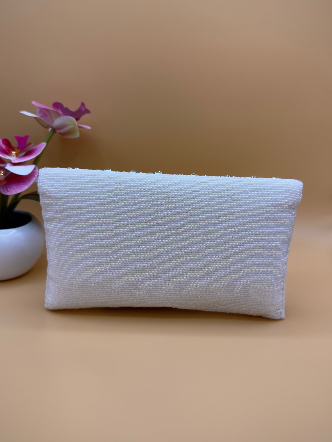 Tas met kralen en kwastjes