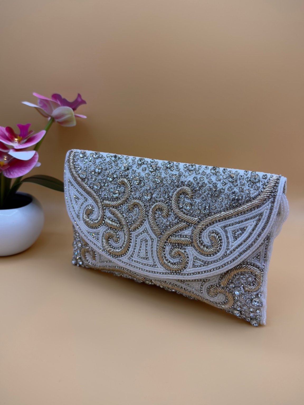 Tas met kralen en kwastjes